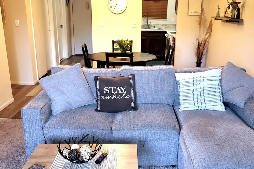 Cozy clean condo with balcony and fitness center. - Image 1