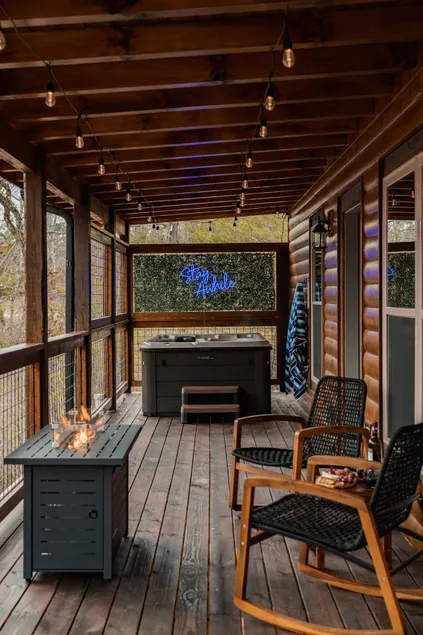 Cozy cabin w/ hot tub & couples’ movie theater - Image 1
