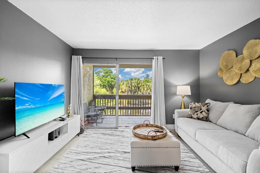 Stylish Gray 2nd-Floor Condo w/ Heated Pool | 1BR - Image 1
