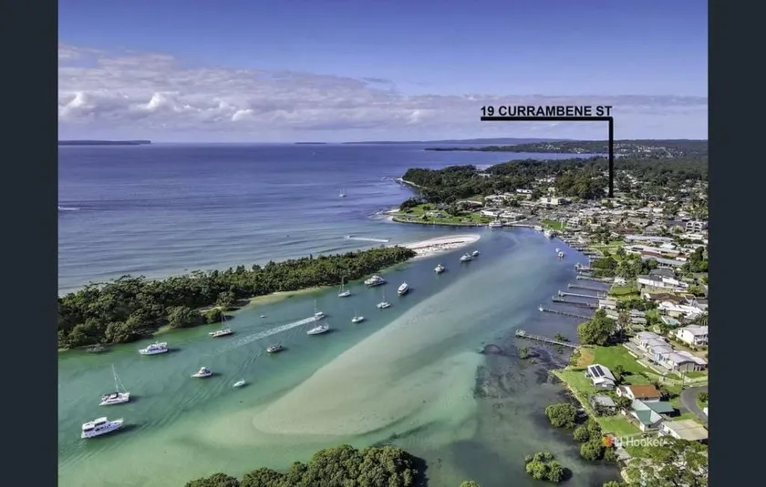 Husky 19 - view of town & water - Image 1