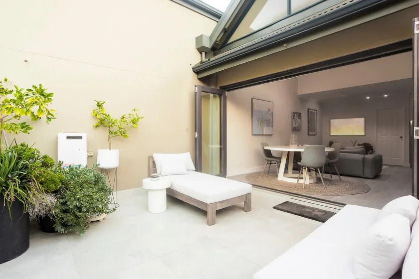 Unique 2BR townhouse with Balcony, BBQ + Parking! - Image 1