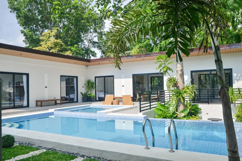 Tropical Haven: Infinity Pool Next to Nature - Image 1