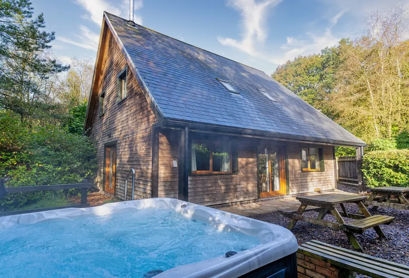 Norbury, woodland lodge with hot tub for 12 - Image 1