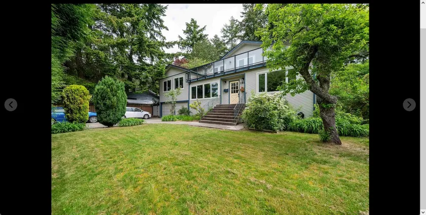 Character House on Shoreline - Image 1