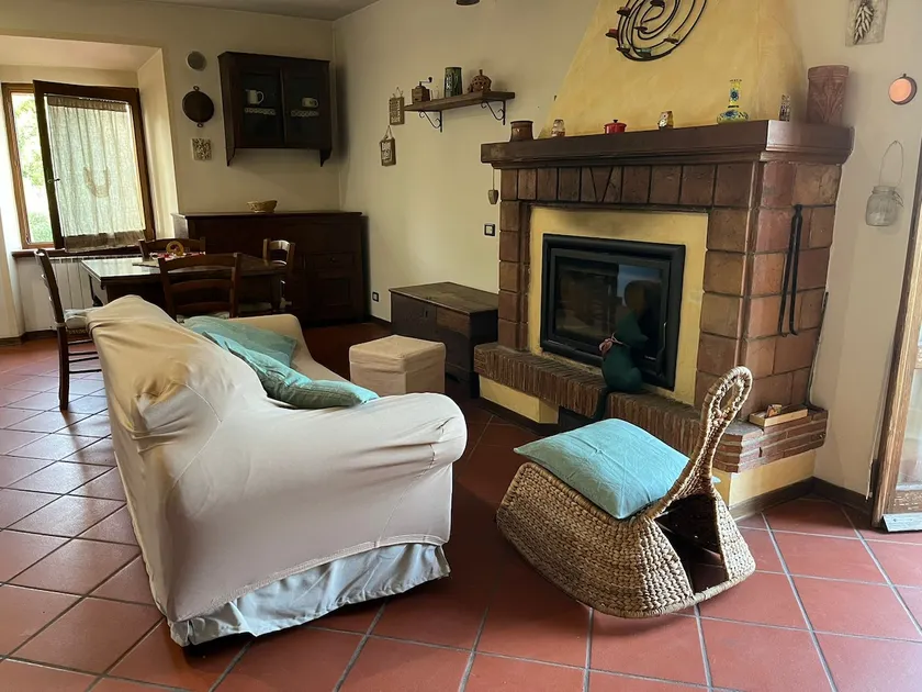 Tuscan-style apartment with fireplace and terrace - Image 1