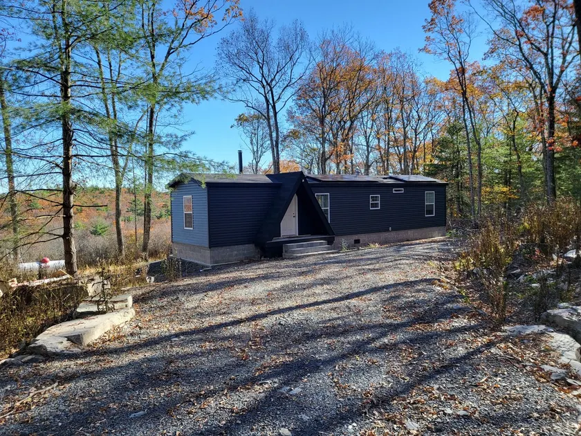 Modern Off-grid Cabin on Hill, 13 acres with Pond - Image 1