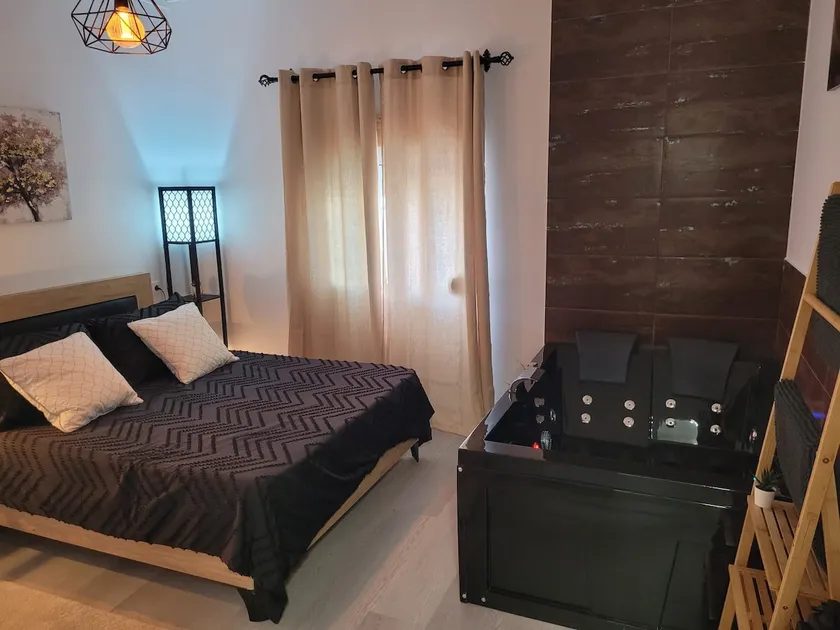 Black Jacuzzi Apartment - Image 1