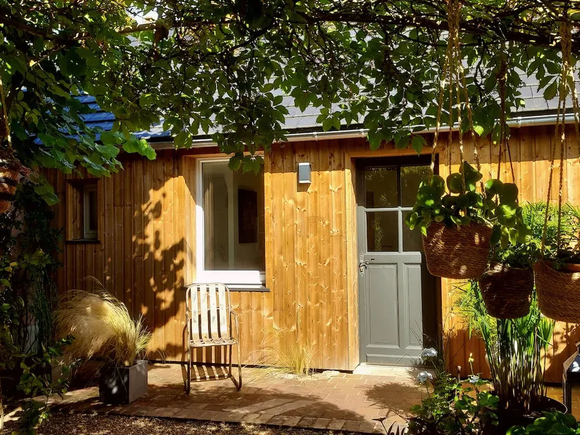 House surrounded by greenery - Image 1
