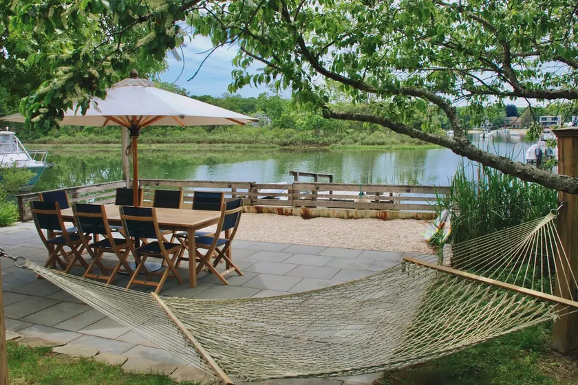 Hamptons Waterfront Beach Home With Dock - Image 1