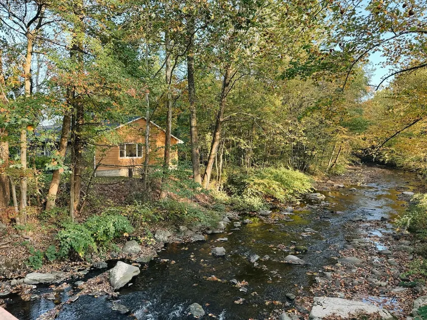 Poconos Creekside Cabin with Hot Tub and Firepit - Image 1