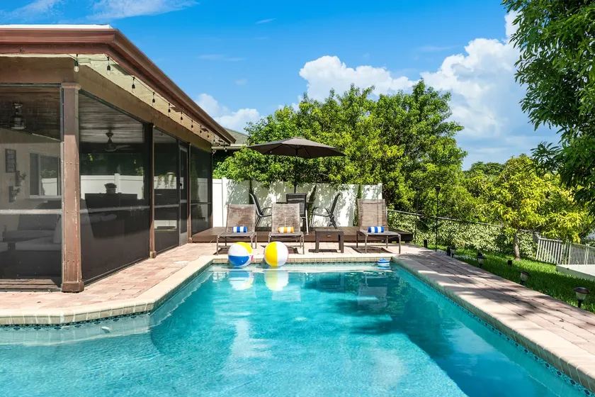 BBQs & Breezes: Waterfront Pool House Escape - Image 1