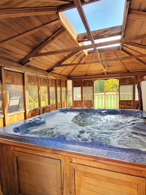 Charming and Peaceful Retreat with Hot Tub - Image 1