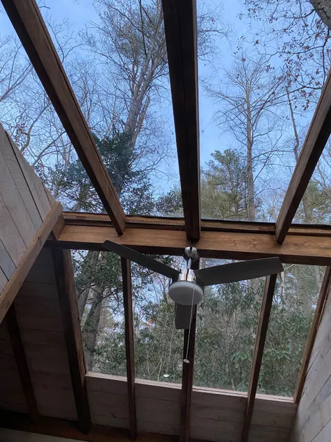*The Moon and You* Creekside Off Grid Glass Cabin - Image 1