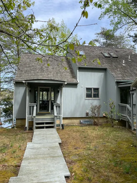 Waterfront home with private dock - Image 1