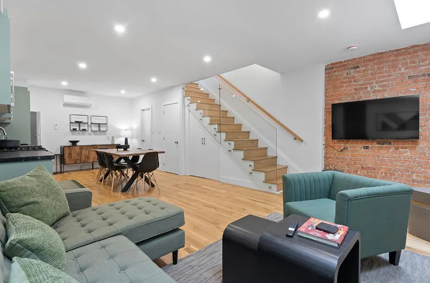 Chic 2BR Top-Floor Retreat w/Rooftop Near Subway - Image 1