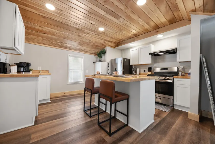 Elegant 2BR w/ Custom Wood Charm - Image 1