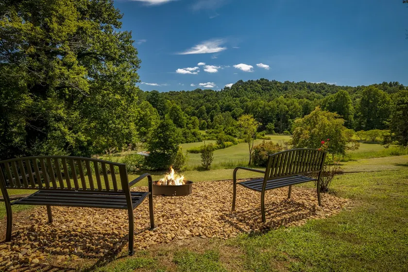 Charming farmhouse on 10 acres - Image 1