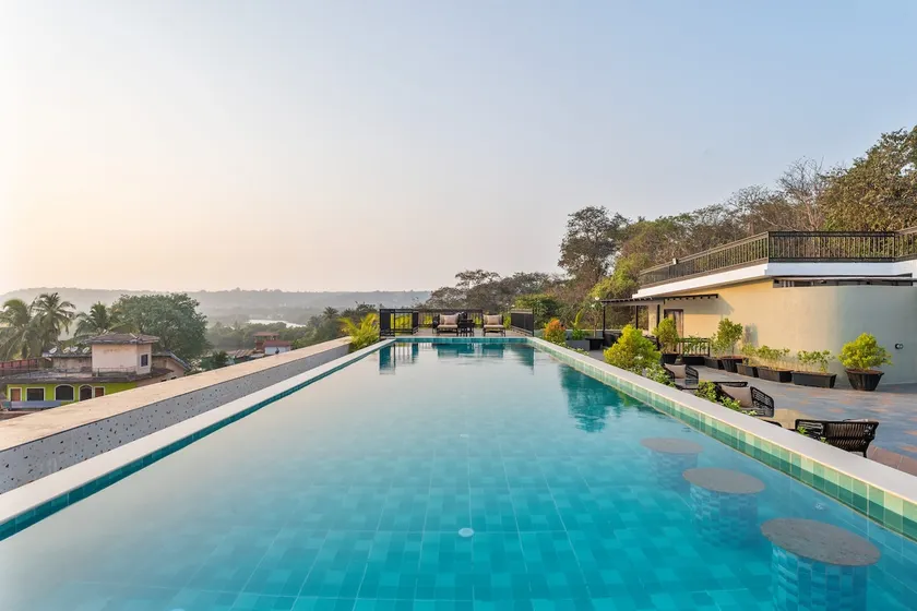 Iris-1BHK Candolim with infinity Pool by Limestays - Image 1