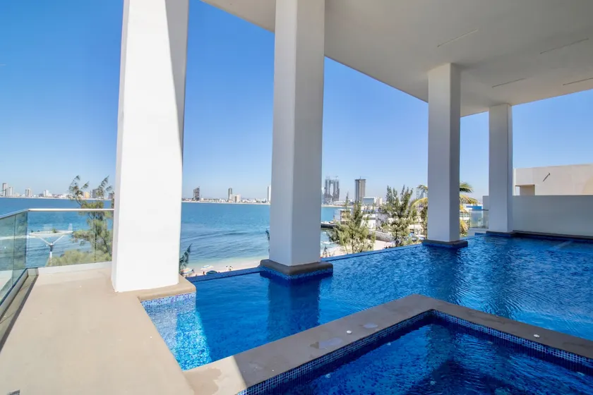 Beachfront · sunsets · pool · 2BR by PH - Image 1