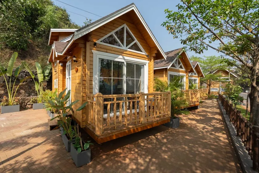 StayVista at Woodhouse | Pool Lawn 3BR Morjim - Image 1