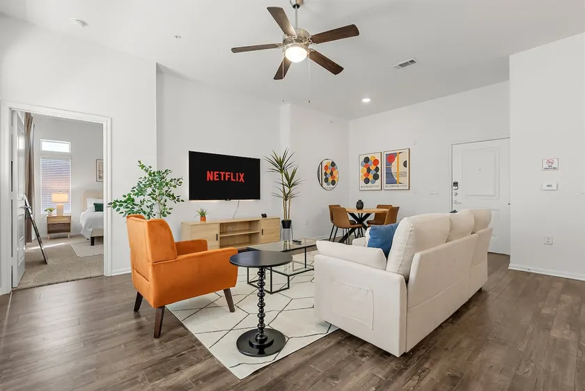 Modern 2BR near Airport & DWTN | Patio | Pool/Gym - Image 1
