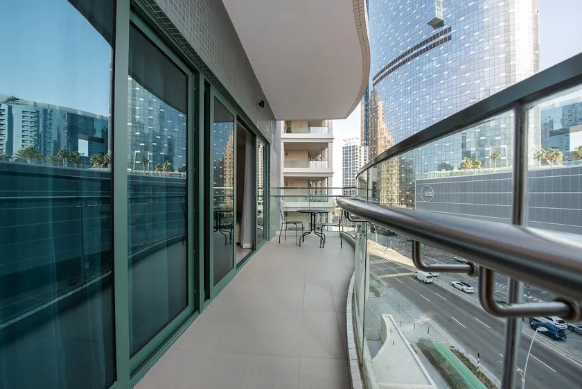 Chic City Escape with Balcony & Pool Access - Image 1