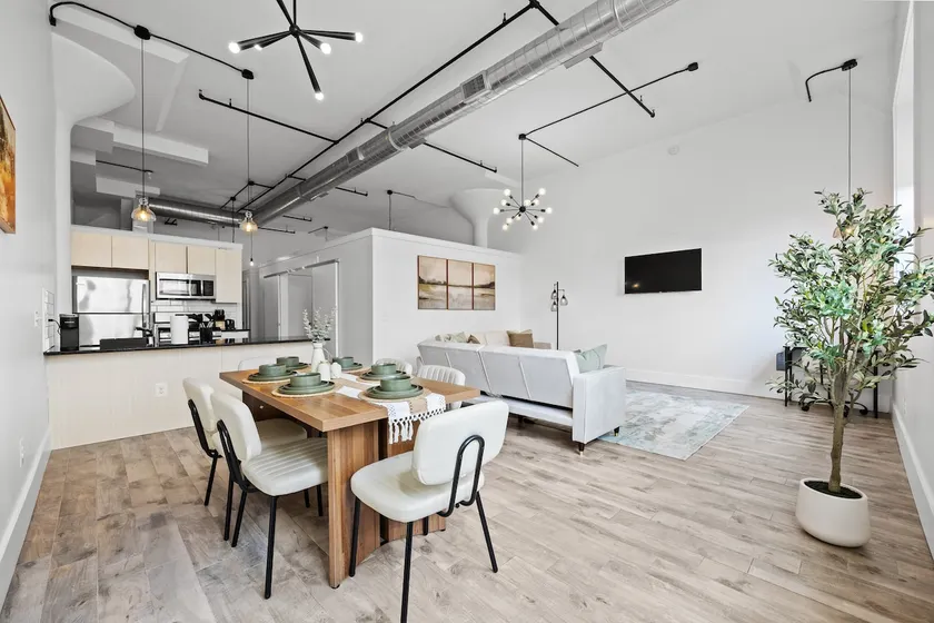 20 Mins to NYC | Chic 2BR Loft w/ Gym & BBQ - Image 1