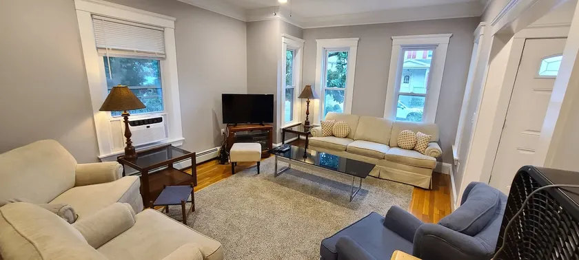 Spacious 4BR Condo • 6 Beds • Parking • Near UMass - Image 1