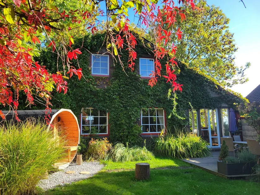 Cozy house on the dike with apple orchard - Image 1