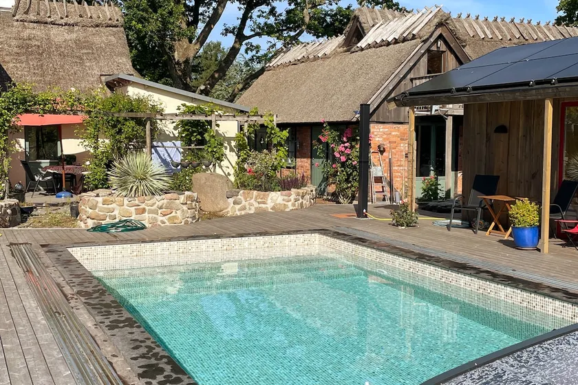 Unique accommodation under a thatched roof, pool and playground - Image 1