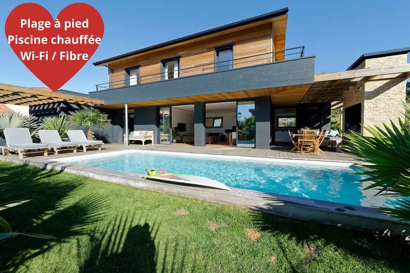 Contemporary villa near beach and town center, heated pool and bicycles. - Image 1