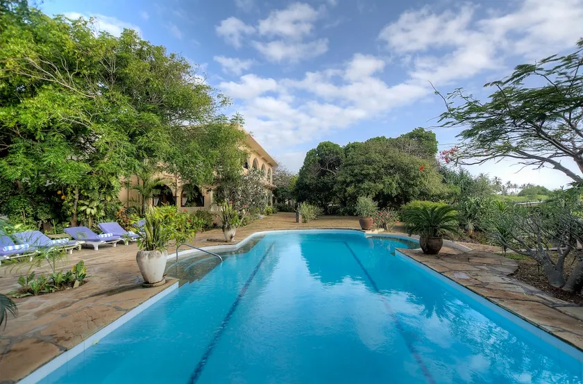 Maweni Beach House · Pool · Cook · 6 Bedrooms - Image 1