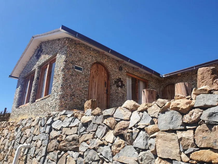 INKA PACHA cabin with two beds and a private bathroom - Image 1