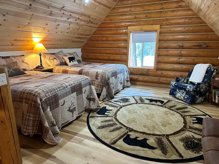 Cozy Riverfront Log Cabin - Image 1