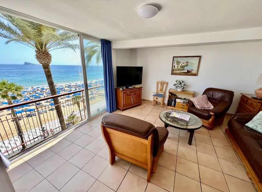 in the center, directly on the sandy beach - Image 1