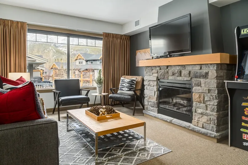 Lovely 3BR condo with Hot Tub at the Edge of Canmore - Image 1