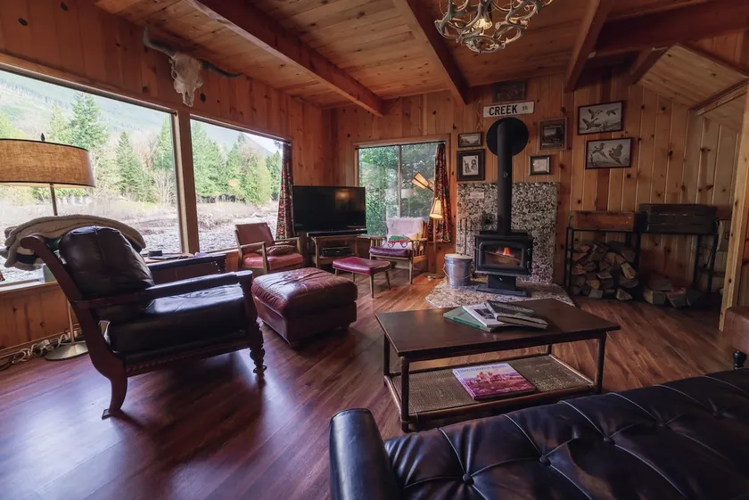 Cozy Riverfront Cabin w/Fireplace + Mountain Views - Image 1