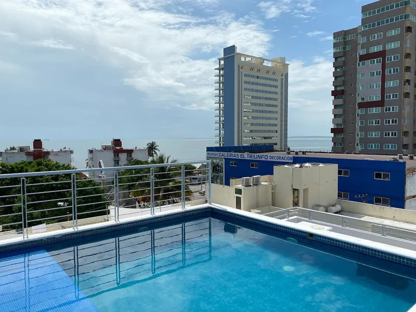 family with pool steps to the beach - Image 1