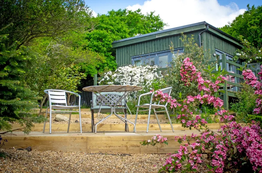 Hollyoak Sanctuary: 4 bedroom cosy Woodland Lodge Retreat - Image 1