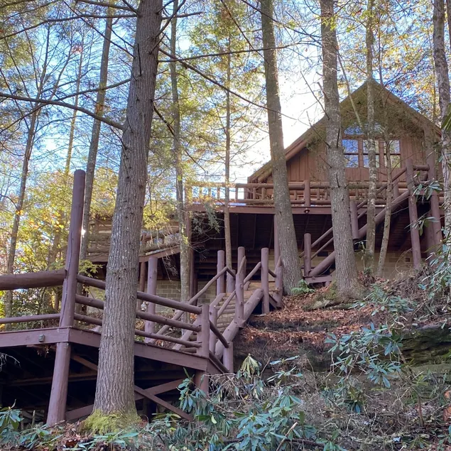 Log Cabin On The Rocks - Image 1