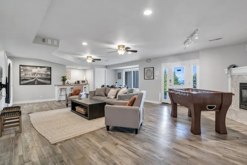 Spacious Walkout Basement w/ 65”TV, King, Hot tub! - Image 1