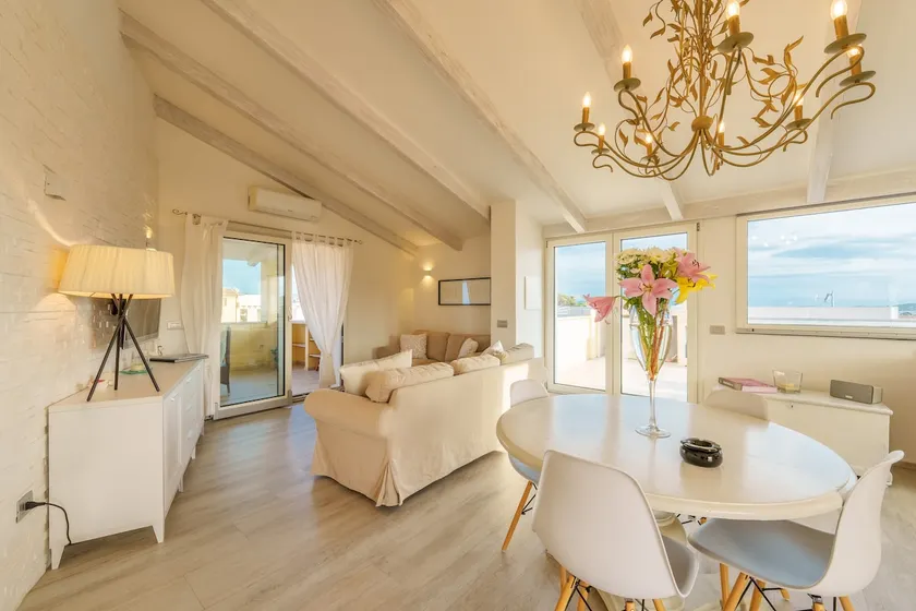 [Golfo Aranci] Penthouse with Sea View, Terrace + A/C - Image 1