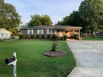 Classic updated home with fenced yard - Image 1