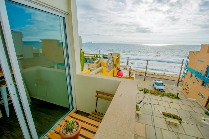 Steps to the beach/partial ocean view + AC/HEAT - Image 1