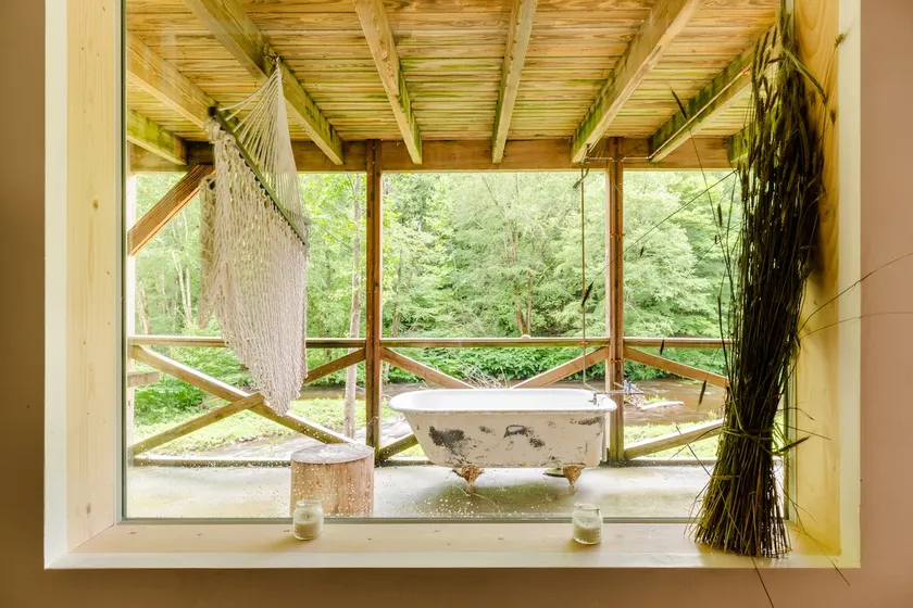 Creekside cottage on 65 acres of land - Image 1