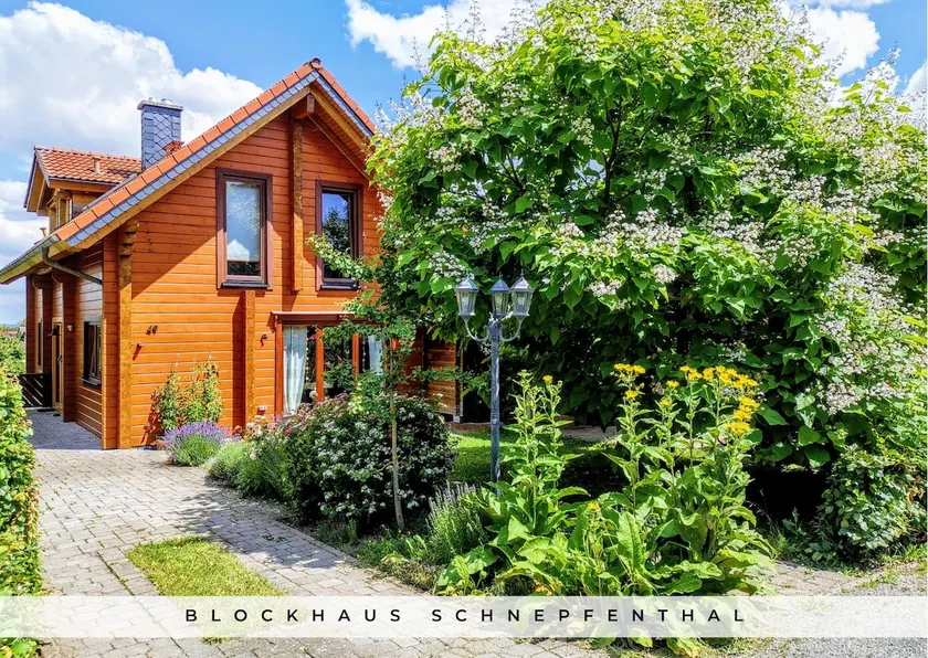 Cozy log cabin by the forest with large garden - Image 1