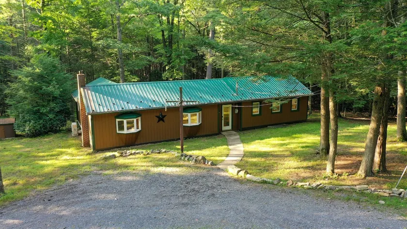 Cozy, serene cabin w/ grill, firepit - Sleeps 10 - Image 1