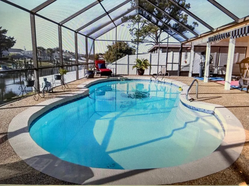  Canal Home 3Br 2BA with Salt Water Heated Pool and Boat DockDiscounts Available - Image 1