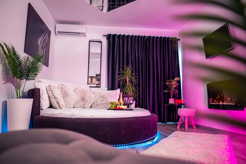 Modern Apartment Craiova, Fireplace, Round Bed - Image 1
