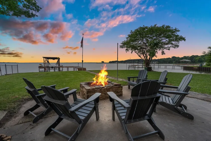 Open water view: cozy hot tub & fire pit with dock - Image 1